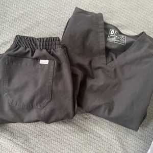 Small black fig scrubs lightly used